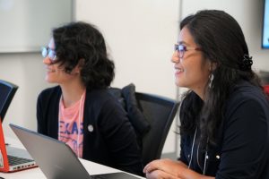 Participants enjoy a Waterhackweek presentation